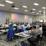 Image of a classroom style wildfire summit presentation