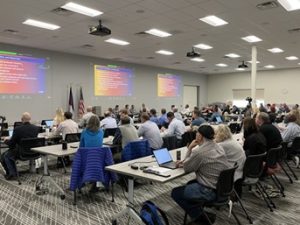 Image of a classroom style wildfire summit presentation