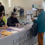 Image of a United Policy Holders presenter at an event