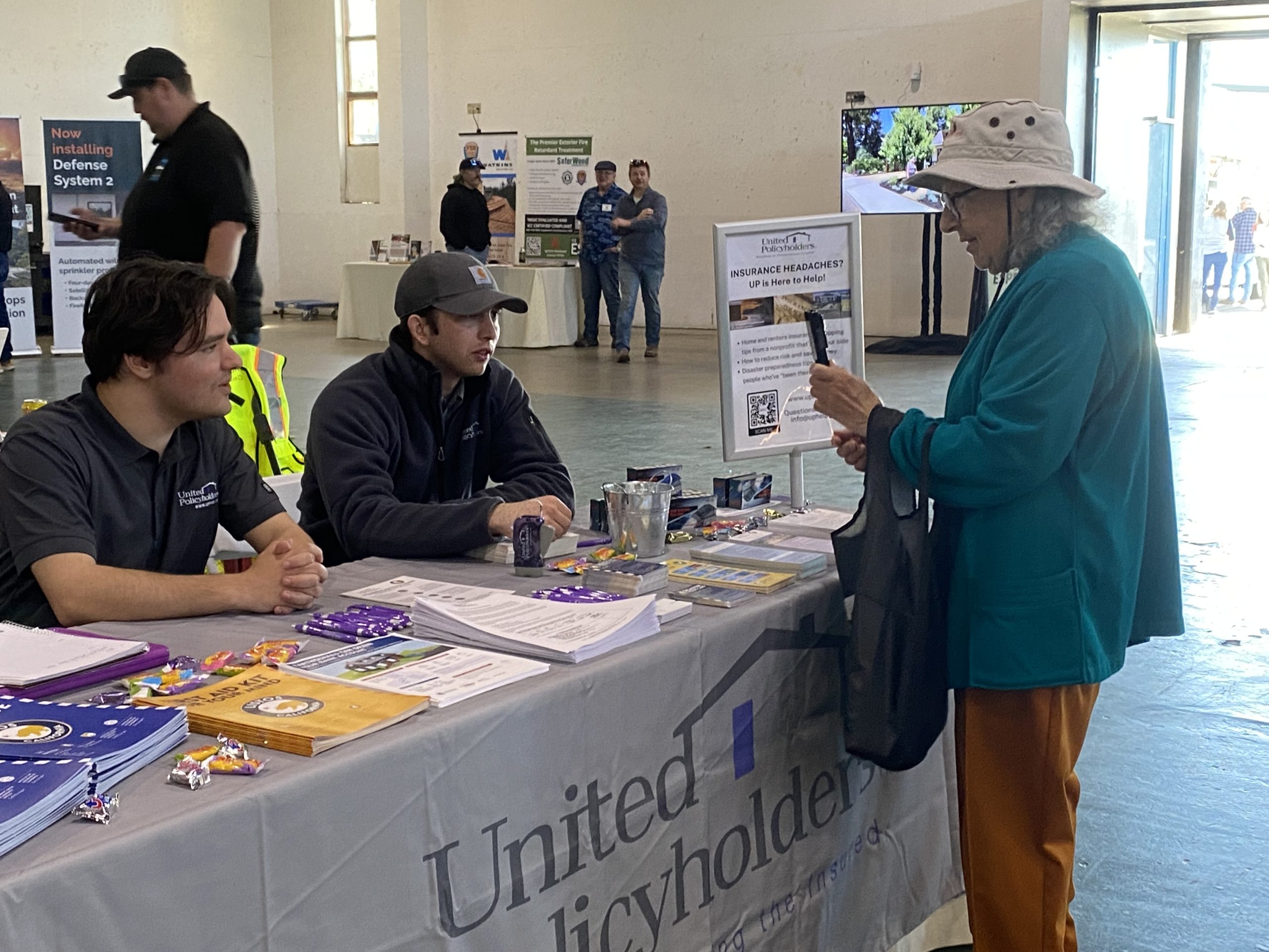 Image of a United Policy Holders presenter at an event