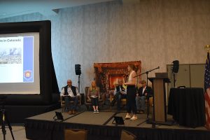 Photo of a conference panel at the 2024 Colorado Wildland Fire Conference