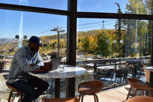 Photo of conference attendee at work, while attending the 2024 Colorado Wildland Fire Conference